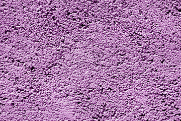 Cement wall texture in purple tone.