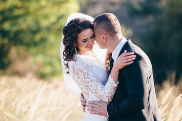 Happy bride and groom on their wedding day