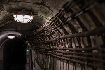 Old pipes in tunnel