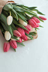Tulips in a bouquet of red and white on a white background