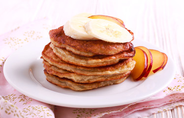 Banana pancakes with fruits on top