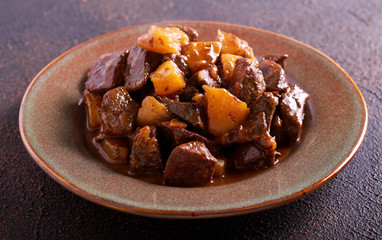 Liver and apple stew in a plate
