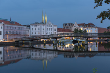 Fototapeta na wymiar On the evening in old town, Lübeck, Germany. 