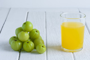 Indian gooseberry on wooden table