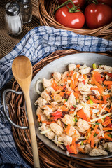 Fried chicken pieces with vegetables.