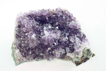 stone with amethyst mineral close up
