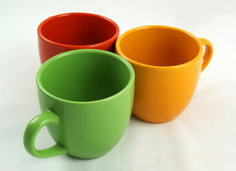 Collection of colorful dishes on the light background