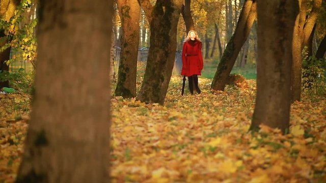 woman walking in the autumn Park