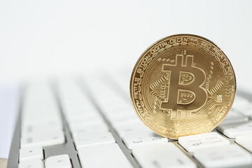 Golden bitcoin coin close up