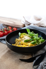 Radiatori pasta in a creamy tomato parmesan cheese sauce