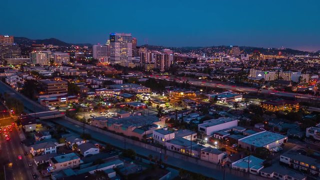 4K aerial cityscape at dusk