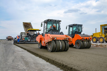 Road construction, asphalt concrete paving