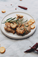  grilled meat solomillo with rise on linen tablecloth. Top view, flat lay