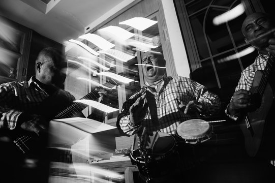 Cuban musical trio acting in the night club