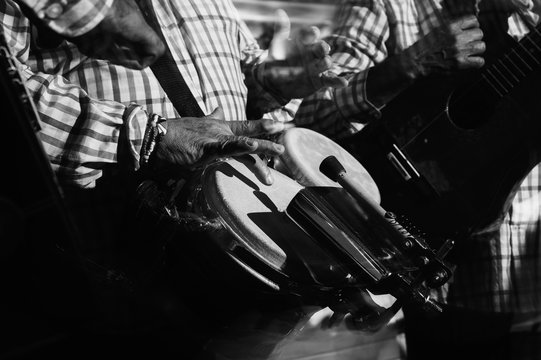 musician playing drums in in the night club