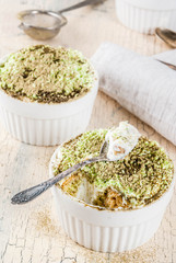 Trendy asian dessert, Green matcha tiramisu, light concrete backgound