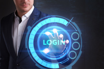 Business, Technology, Internet and network concept. Young businessman working on a virtual screen of the future and sees the inscription: Login