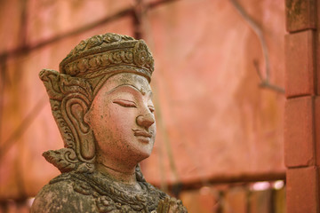 Stucco and sandstone carvings. The old moss has a moss and moss. The faith of ancient people according to the beliefs of Hindu and Cambodian art, Angkor Wat, Siem Reap, Cambodia. And stone castle in T