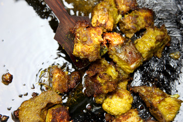 shallow Frying fish slices in the hot oil.