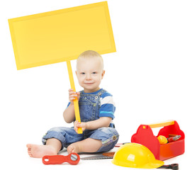 Child holding Banner Sign, Baby Boy Playing Toys Tools, Kid sitting with Blank Board Isolated over White Background, infant one year old