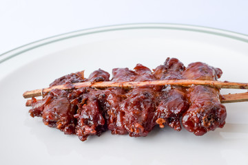 Grilled neck chicken,Thai style food(Low cost) isolated on white background.