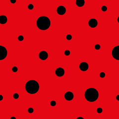 Seamless background consisting of black circles on a red background. Vector illustration