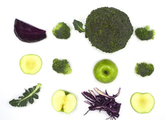 green broccoli and cutting in pattern, green apple, purple cabbage with sliced isolated on white background. vegetable for good health benefits. ingreedient for cooking