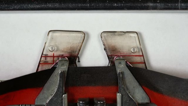 Macro detail of the type of electric typewriter with ribbon typing I can do it