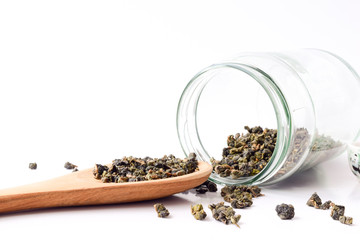 Dry tea in wooden spoons,Dry oolong tea for healthy