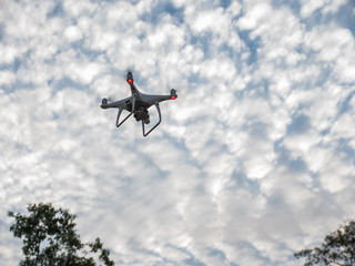 Fototapeta na wymiar Flying drone with digital camera