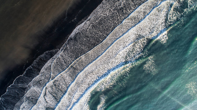 The black sand beach in Iceland. Aerial view and top view. Beautiful natural backdrop.