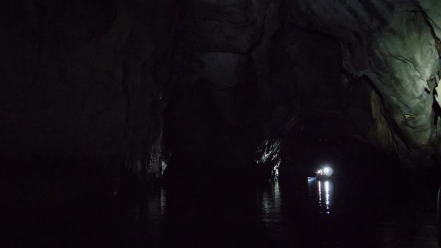 Floating inside Underground river by boat, Sabang, Philippines
