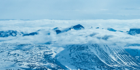 Mountain peak in the clouds