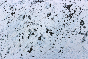 White concrete wall with putty