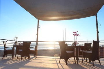 A Table Set up for a romantic meal on the beach