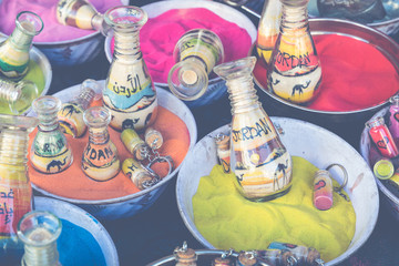 Souvenirs from Jordan - bottles with sand and shapes of desert and camels.