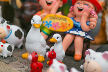 Ceramic dolls in the park