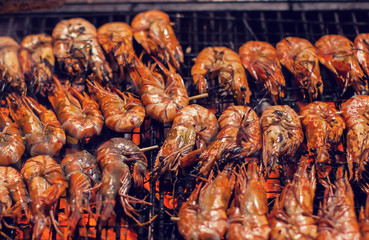 shrimps Seafood barbecue grilled on roaster and fire
