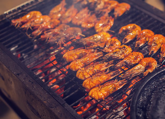 shrimps Seafood barbecue grilled on roaster and fire