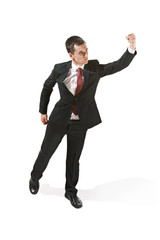 Above portrait of a businessman with very serious face. Confident professional with piercing look in the foreground of the camera.