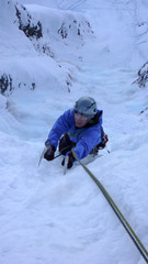 Fototapeta na wymiar ice climbing in the Alps oif Switzerland