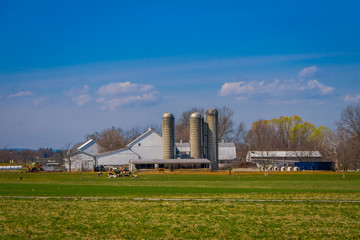 Outdoor view of huge structures located in farm barn field agriculture in Lancaster