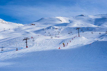 Fototapeta na wymiar Empty slopes of French ski resort in the Pyrenees