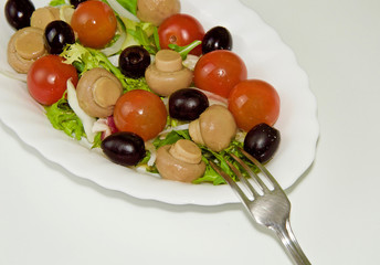 Naklejka na ściany i meble Vegetable salad with olive oil