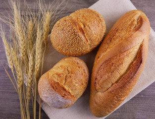 Flat lay various of breads on wooden background  Bakery,food concept