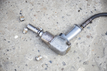 Air impact wrench on the ground, close-up image