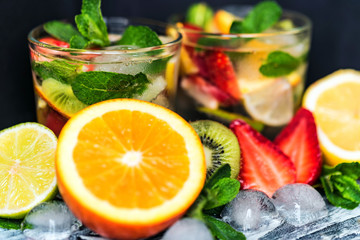 Homemade lemonade with fruit and mint