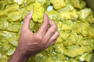 Naklejka na ściany i meble Deep Frying raw fish in the pan in india