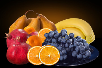 Fresh fruits isolated on a dark background