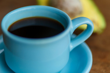 blue cup of coffe and avocado